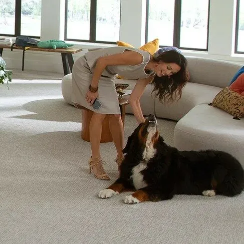 Our-Services Happy lady with dog | Floors In Motion